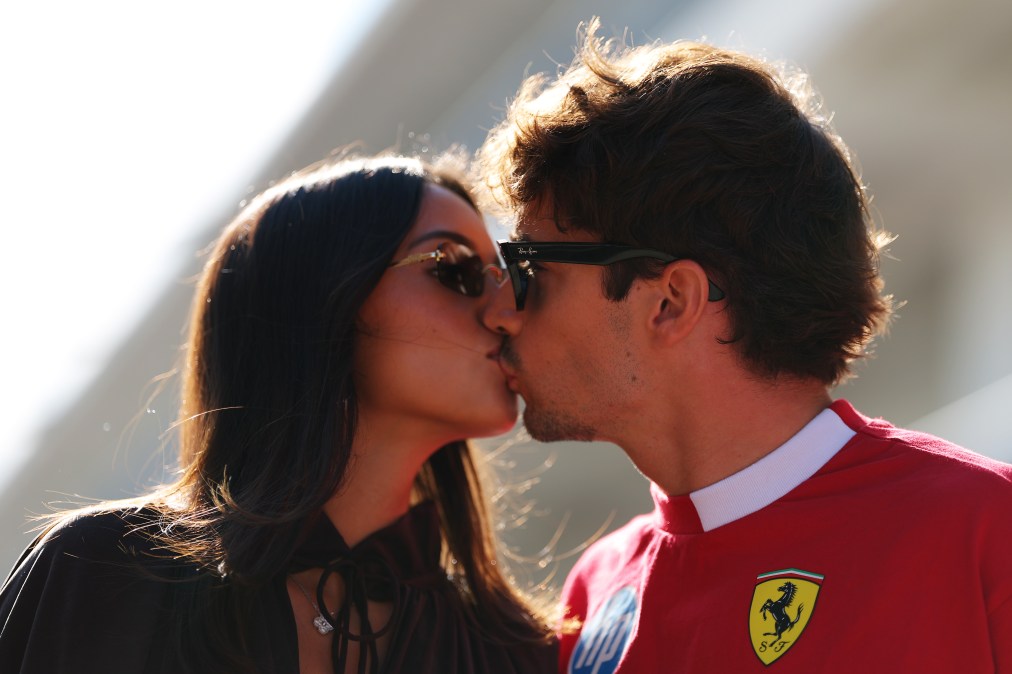 Alexandra Saint Mleux kisses Charles Leclerc 