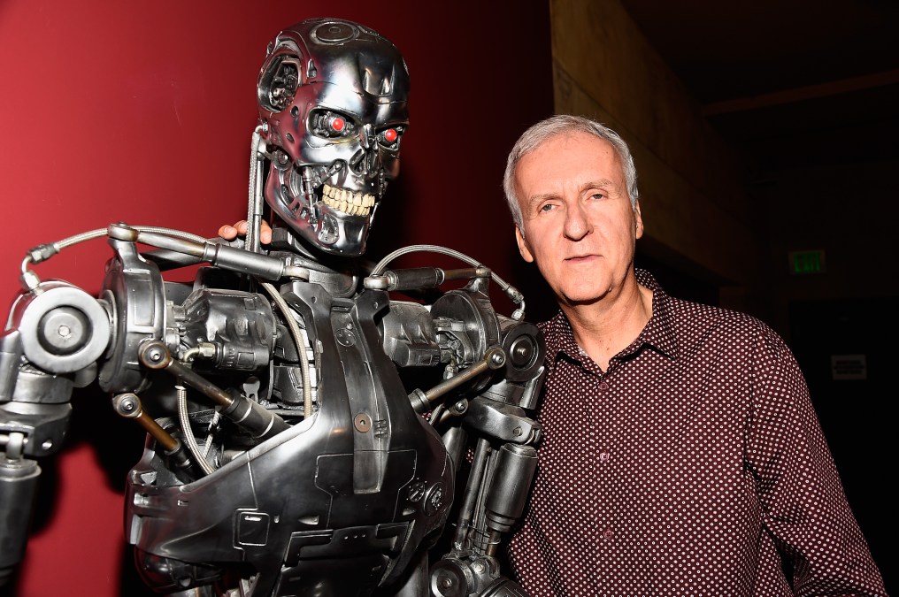 James Cameron poses with terminator