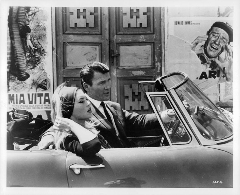 Brigitte Bardot and Jack Palance in car in a scene from the film 'Contempt', 1963.