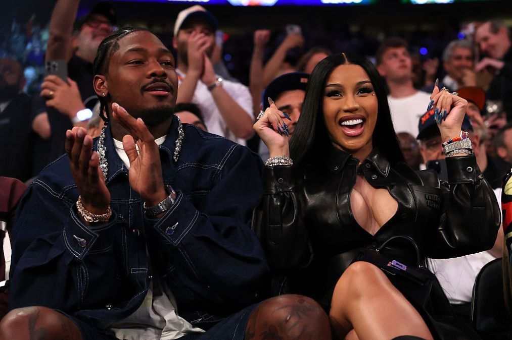 Stefon Diggs and Cardi B sit court-side