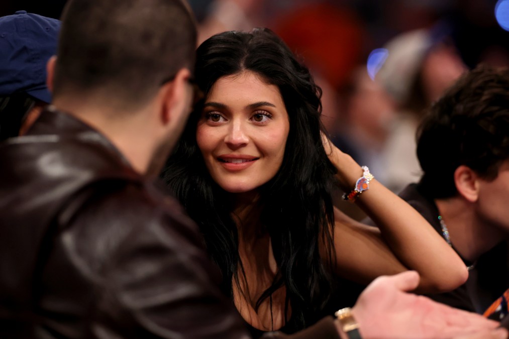Kylie Jenner sits court-side