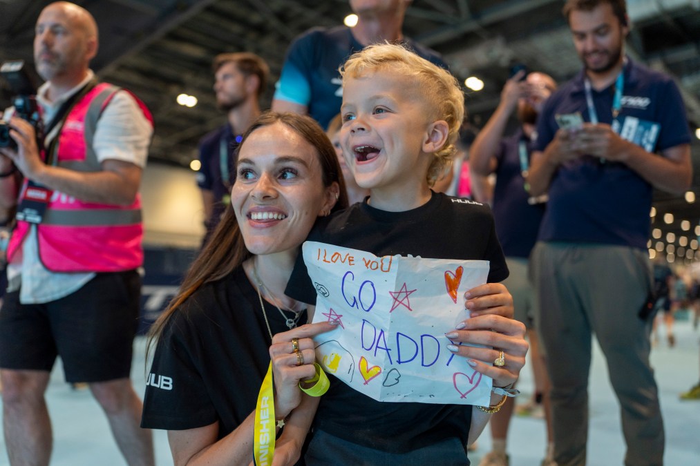 swimmer Adam Peaty (not pictured) is cheered on by fiance Holly Ramsay and son George during the London T100 Triathlon on August 10, 2025