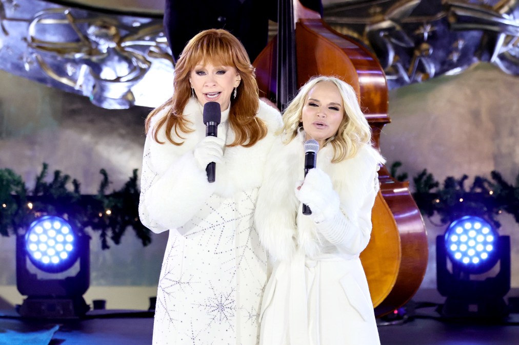 Reba McEntire and Kristin Chenoweth perform during the 2025 Rockefeller Center Christmas Tree Lighting Ceremony