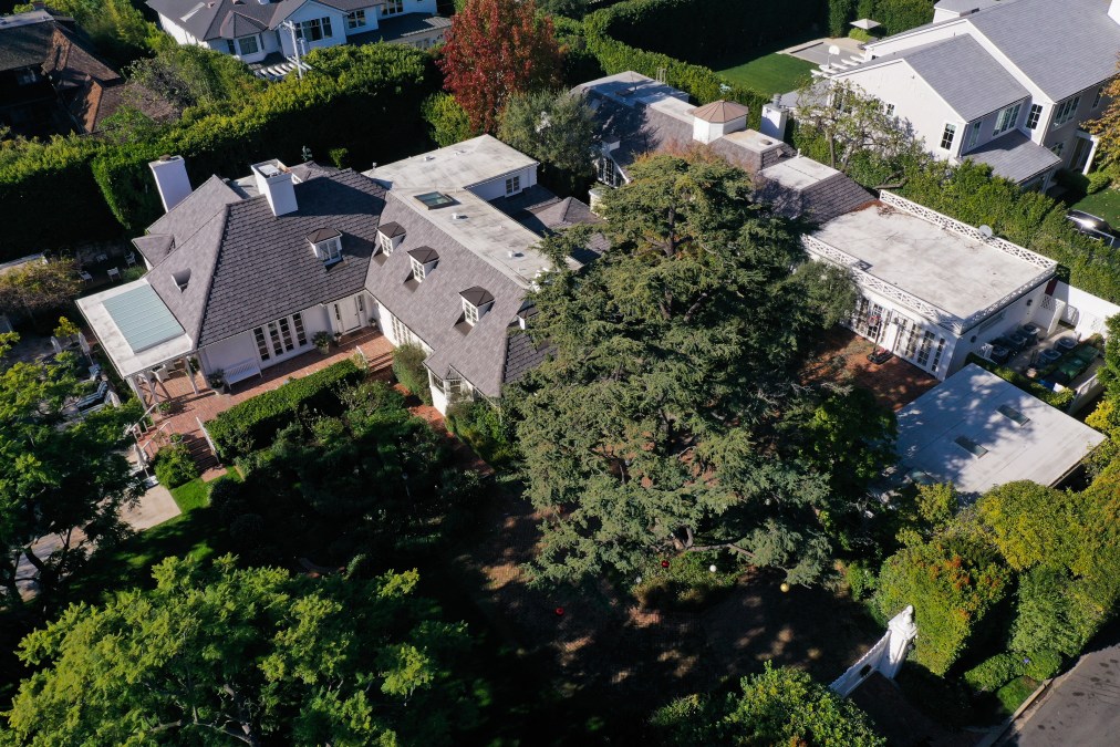 An aerial image shows the home of US actor and director Rob Reiner following their death in the Brentwood neighborhood of Los Angeles, California on December 15, 2025 after Reiner and his wife Michele Reiner were found dead at their southern California mansion. Reiner's son was charged with murder, police said on December 15, after his father and mother were found dead the previous day in their Los Angeles home.