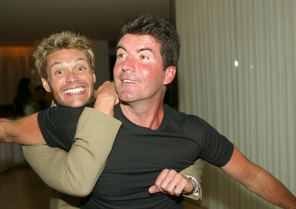Ryan Seacrest and Simon Cowell