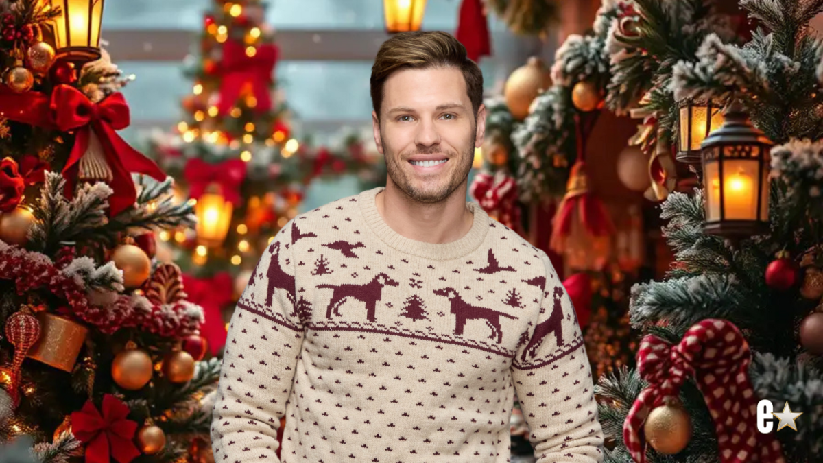 Craig Geoghan smiling in reindeer sweater
