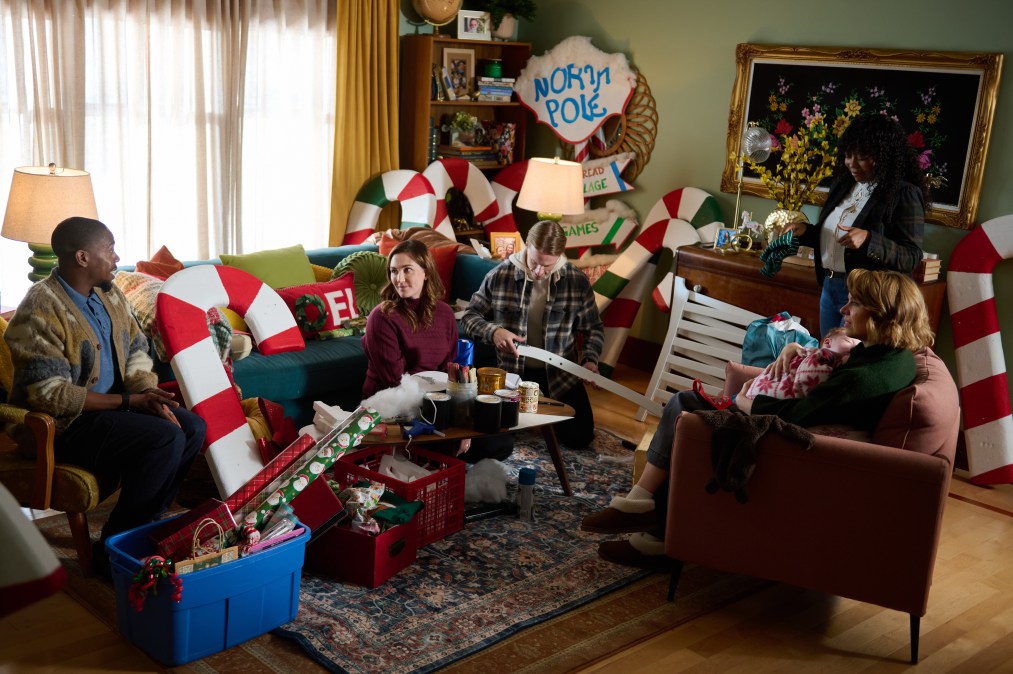 Andrew J Hampton, Katherine Barrell, Lucas Pfob, Katrina Reynolds, Ali Liebert sitting with decorations