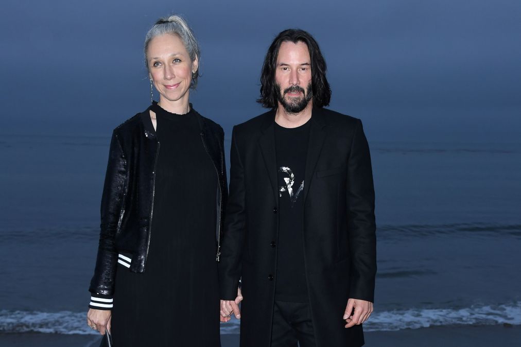 Canadian-US actor Keanu Reeves (R) and US artist Alexandra Grant 