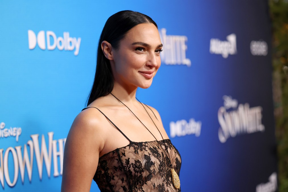 Gal Gadot poses for photos at an event 