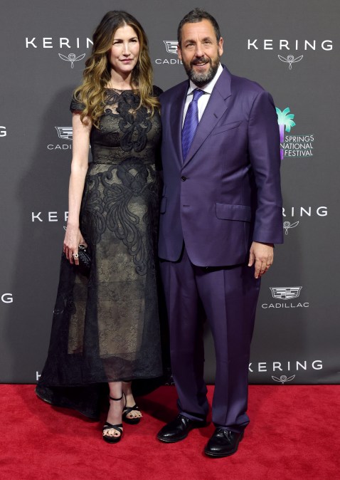 Jackie Sandler and Adam Sandler pose for photos