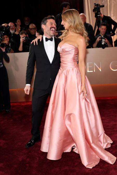 Chris Convy and Nikki Glaser attend the 83rd Annual Golden Globe Awards