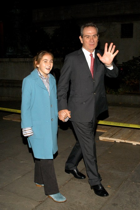 Tommy Lee Jones and young Victoria Jones holding hands