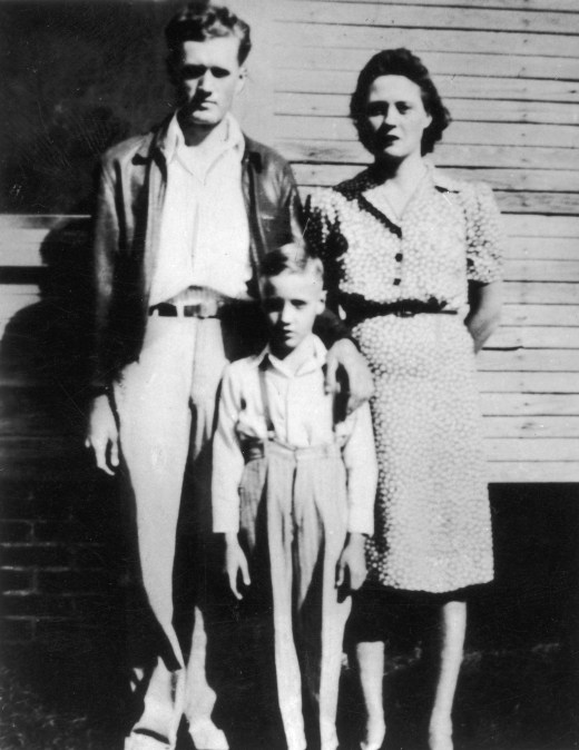 Elvis Presley and his parents.