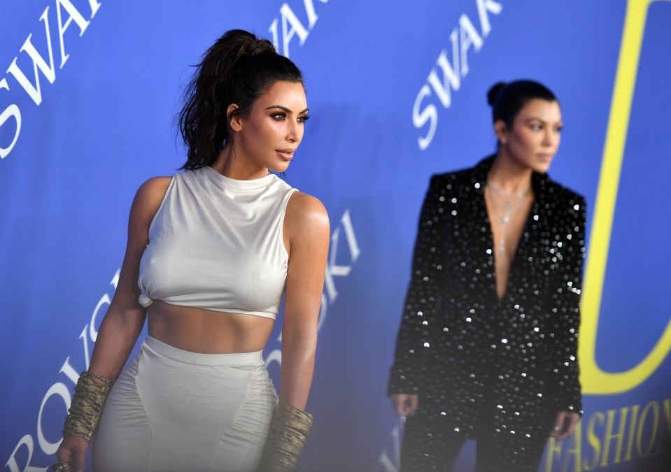 Kim Kardashian and Kourtney Kardashian.