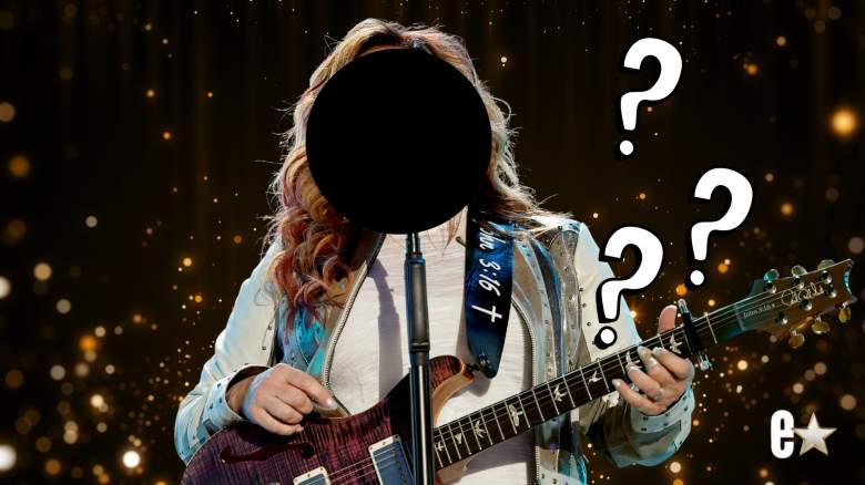 Jo Dee Messina playing guitar onstage