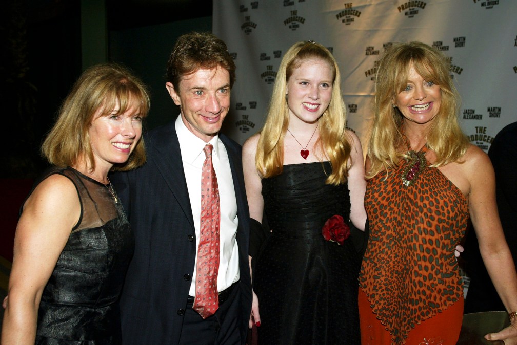 Actor Martin Short, his wife Nancy (L), and daughter Katherine pose with actress Goldie Hawn (L) at the after-party for "The Producers"