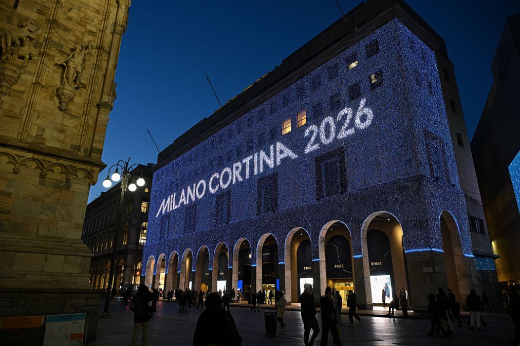 Milano Cortina 2026 illuminations are seen on the Rinascente department store at night in Piazza Duomo ahead of the Milano Cortina 2026 Olympic Games