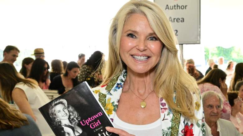 Christie Brinkley smiling at a book signing
