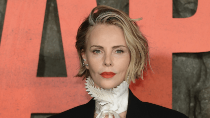 Charlize Theron, 50, Stuns in Plunging Sheer Dress in Paris After Posing in ‘Nothing But Diamonds’