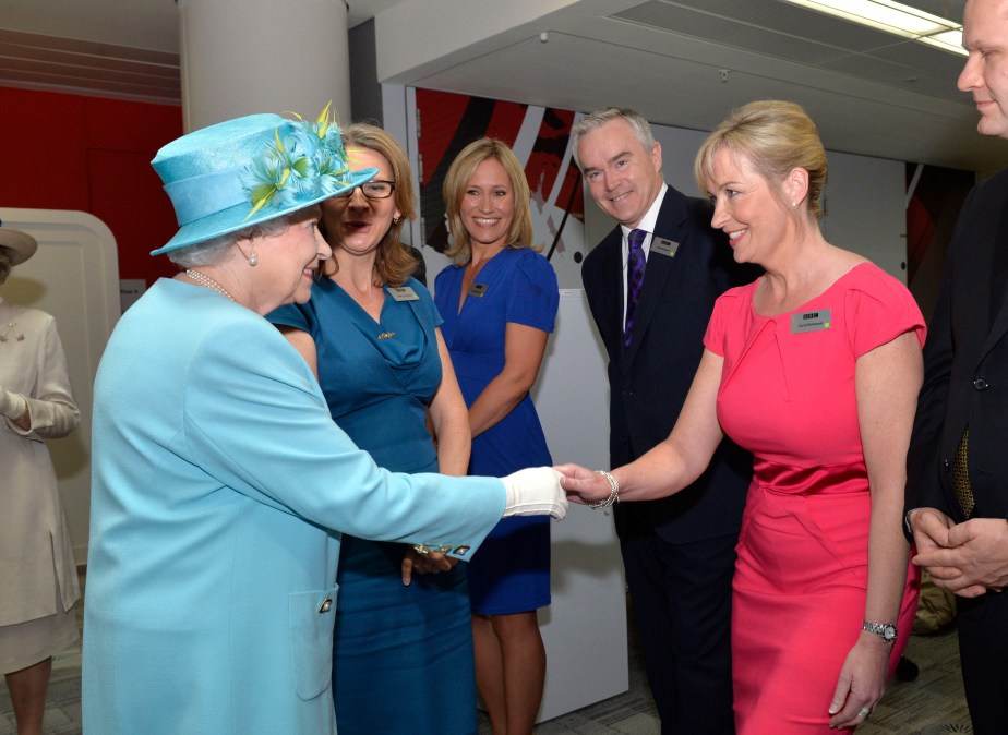 Queen Elizabeth II meets weather presenter Carol Kirkwood as she opens the new BBC Broadcasting House on June 7, 2013 in London, England. 
