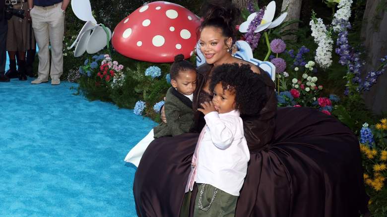 Rihanna poses with sons RZA and Riot at the “Smurfs” U.S. premiere in Los Angeles