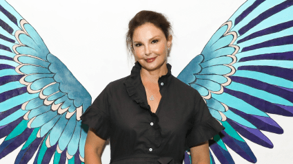 Ashley Judd’s Blue & White Swimsuit Video Has Her Showing off Her Gray Hair & Playful New Era