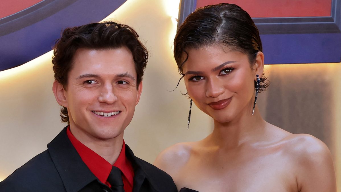 Tom Holland and Zendaya pose together at the 