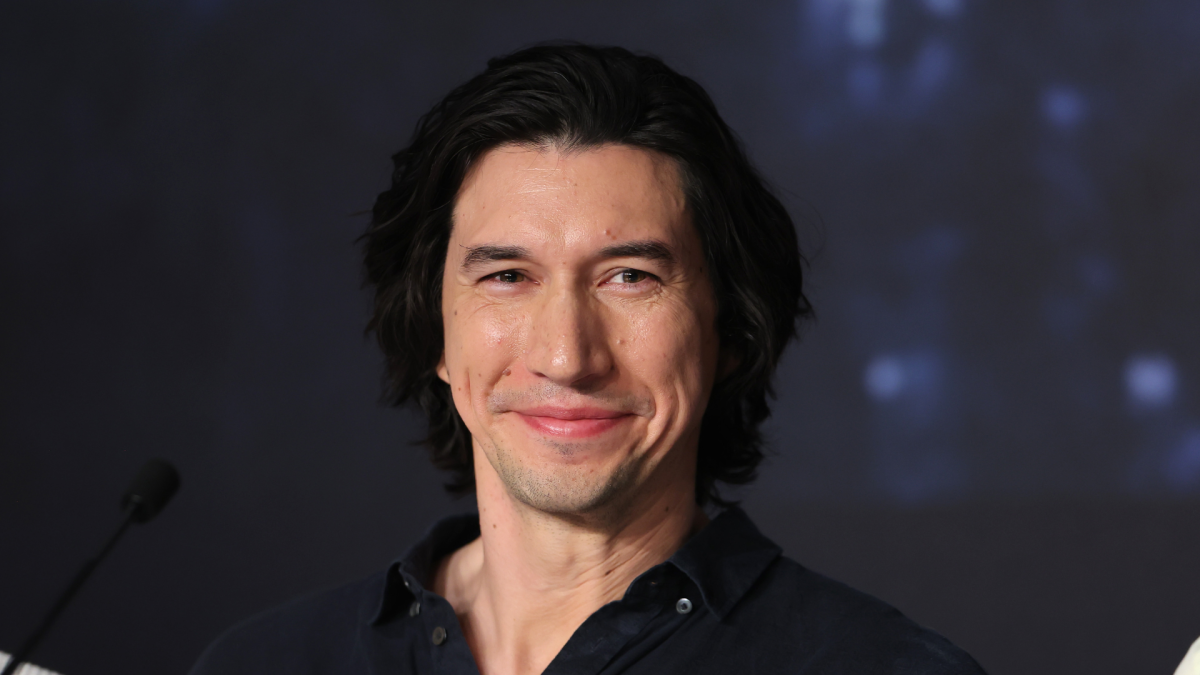 Adam Driver smiling.