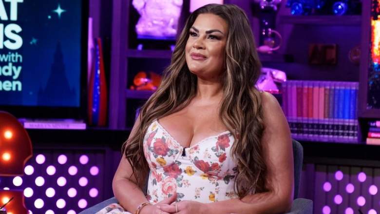Brittany Cartwright appears on Watch What Happens Live with Andy Cohen wearing a floral dress.
