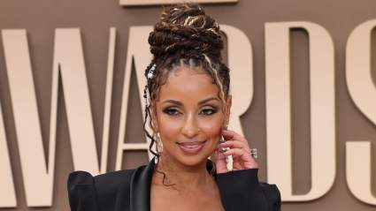 Mya, 46, Hasn’t Aged a Day in Low-Cut Figure-Hugging Gold Dress