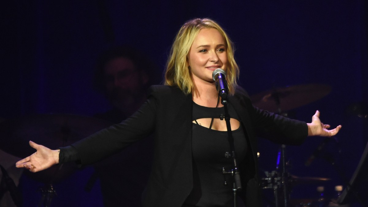 Hayden Panettiere onstage with a microphone