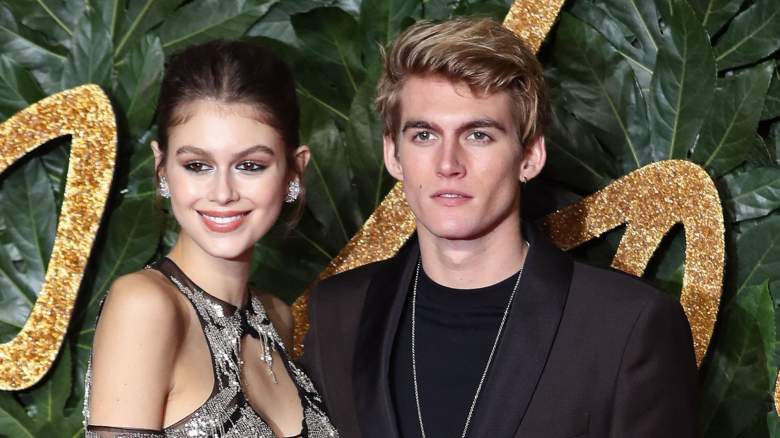 Kaia Gerber smiles next to Presley Gerber