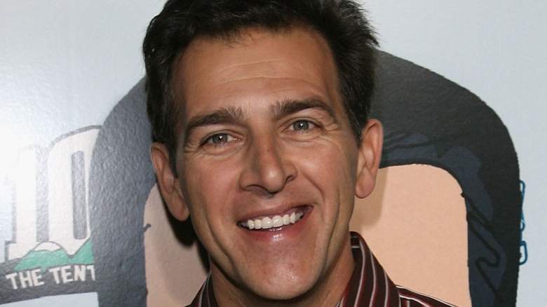 John D'Aquino posing at an event