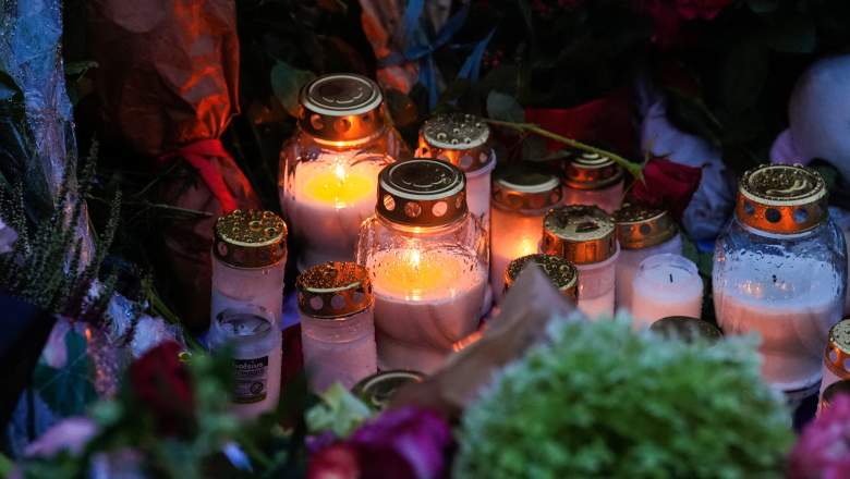 Candles and flowers for Gary Waddell.