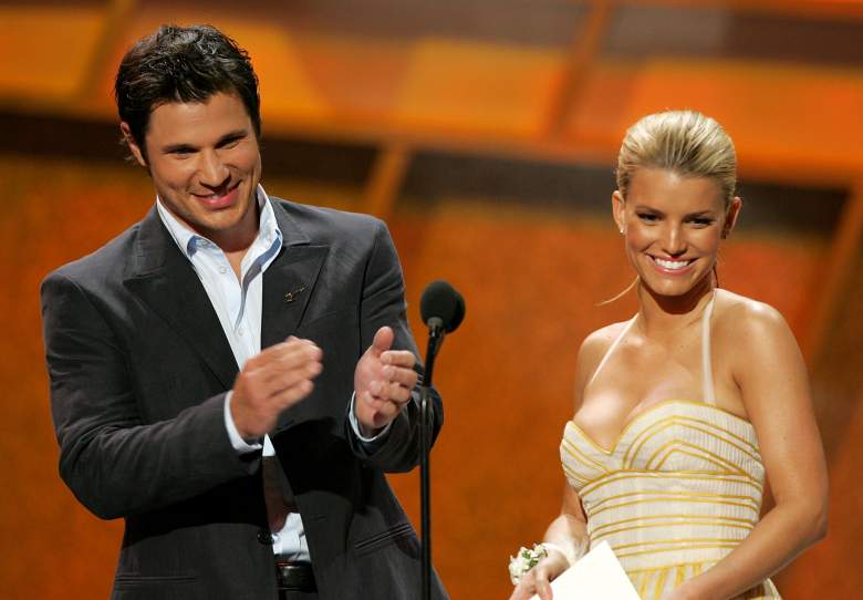 Singers Nick Lachey (L) and Jessica Simpson present the award for Best Championship Performance onstage at the 13th Annual ESPY Awards