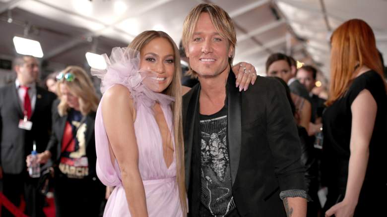 Jennifer Lopez and Keith Urban smile for a photo at The 59th GRAMMY Awards in 2017.