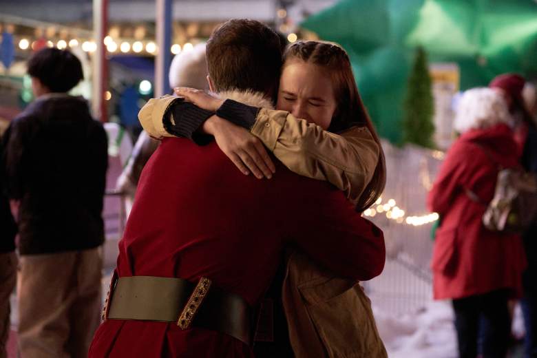 Alex MacIsaac hugs her onscreen dad, Brendan Penny, in a touching scene in Hallmark's "Mr. & Mrs. Christmas."